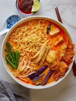 Laksa Johor! A Creamy Coconut Curry Broth Brimming With Fresh Seafood and Tangy Noodles.