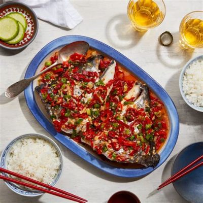  Spicy Steamed Fish Head With Pickled Cabbage: A Symphony of Sizzling Heat and Tangy Delight