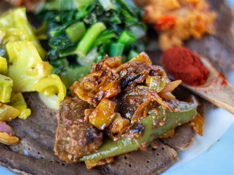 Tibs, A Hearty Ethiopian Stew That Melts In Your Mouth Like Butter On A Warm Waffle Iron!