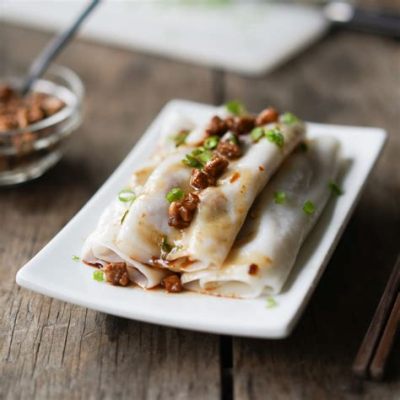  Zhuzhou Steamed Rice Noodles with Crispy Meat: Indulging in Umami-Rich Broth and Tenderly Spiced Pork Belly?